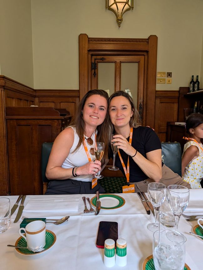Becky and Giulia at the celebration table