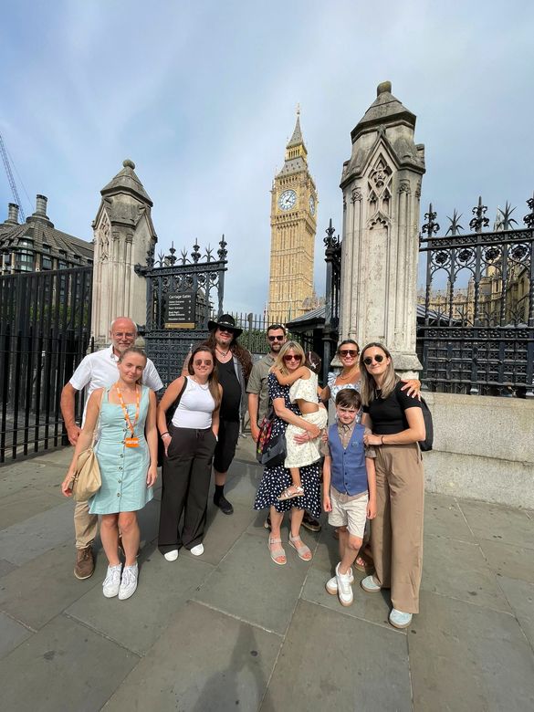 Family and friends at the gates of Parliament